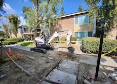 Plumbing Heroeos Repairing Sewer Pipe